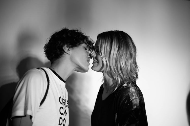 Two people kissing backstage at the Zadig & Voltaire Fall 2017 show 