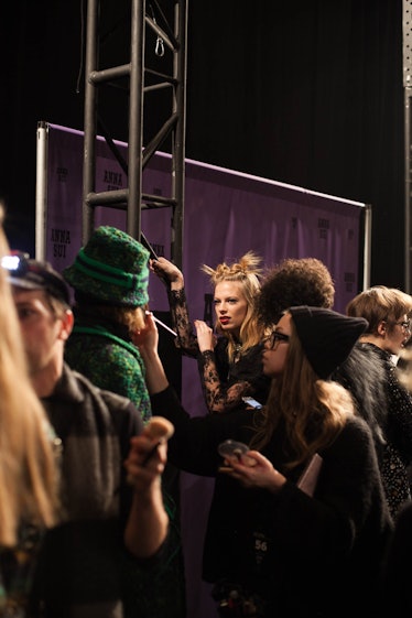 A group of models standing and waiting backstage at Anna Sui Fall 2017