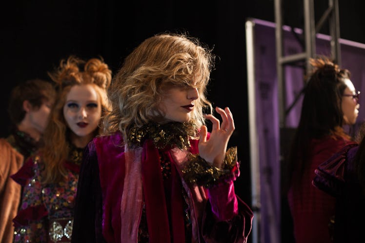 A group of models standing and waiting backstage at Anna Sui Fall 2017 before the show