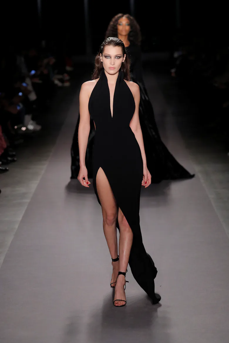 bella hadid black dress runway Bella Hadid wears bombshell little black dress on the New York Fashion Week runway