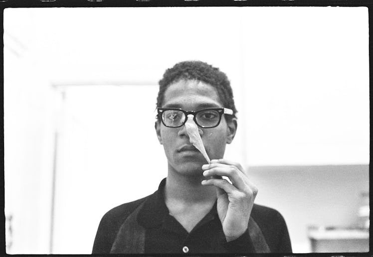 Basquiat performing in the apartment, c. 1980.jpg