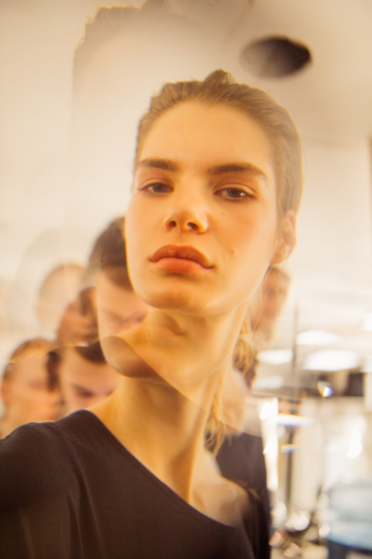 Closeup f a female model wearing a black shirt