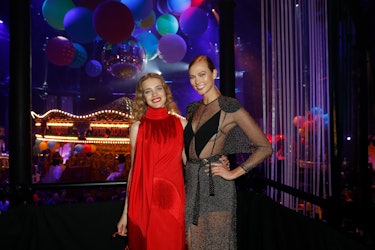 Antoine Arnault and Natalia Vodianova attend the Shiatzy Chen show as
