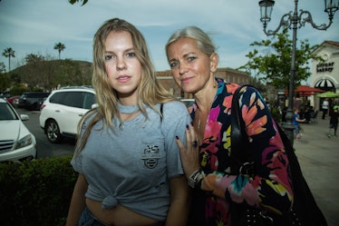A mother and a daughter posing for a photo in Calabasas.