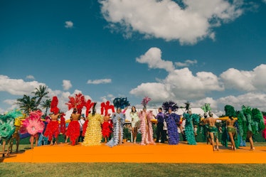 Performers wearing colorful puffy gowns at Veuve Clicquot’s Third Annual Carnaval party in Miami.