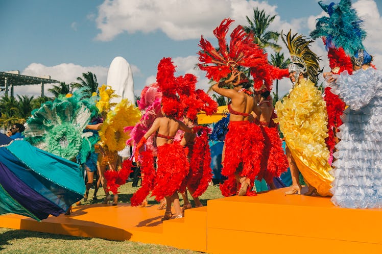 Performers in their colorful carnival outfits at Veuve Clicquot’s Third Annual Carnaval party in Mia...