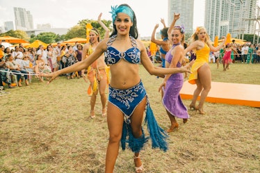 A dancer in a blue carnival costume at Veuve Clicquot’s Third Annual Carnaval party in Miami.