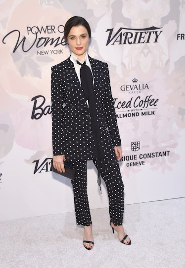 Rachel Weisz wearing a black chic polka dot suit