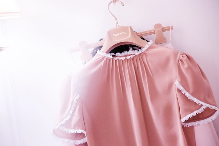 Aja Naomi King's pink Miu Miu blouse