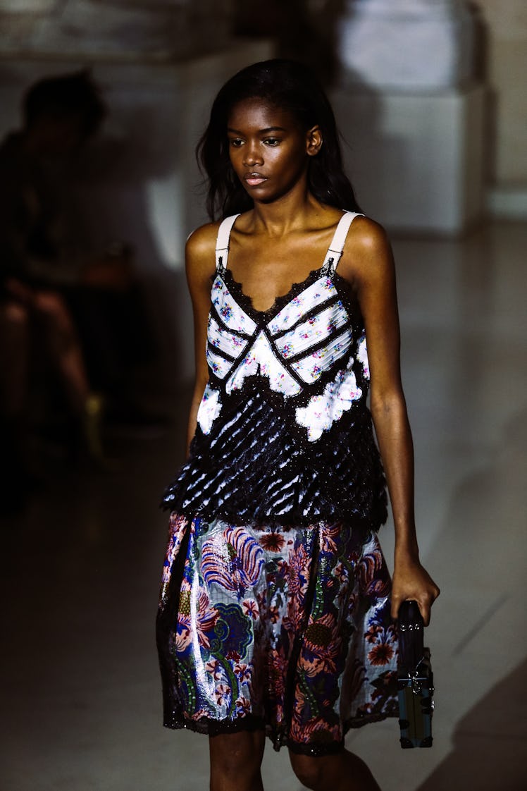 A model wearing pieces from Louis Vuitton’s Fall 2017 collection walking the runway.