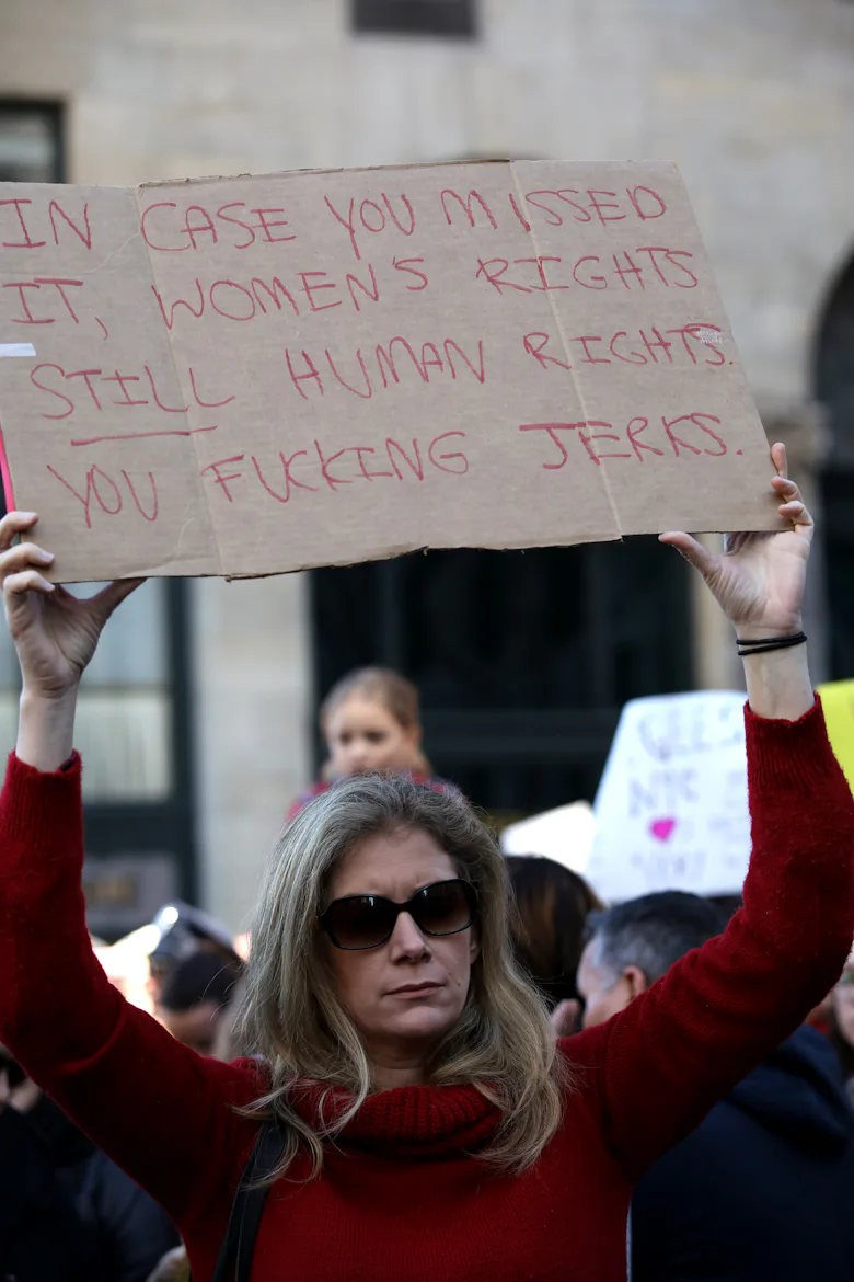 Women united in the city square during the strike, their faces a mosaic of determination and hope