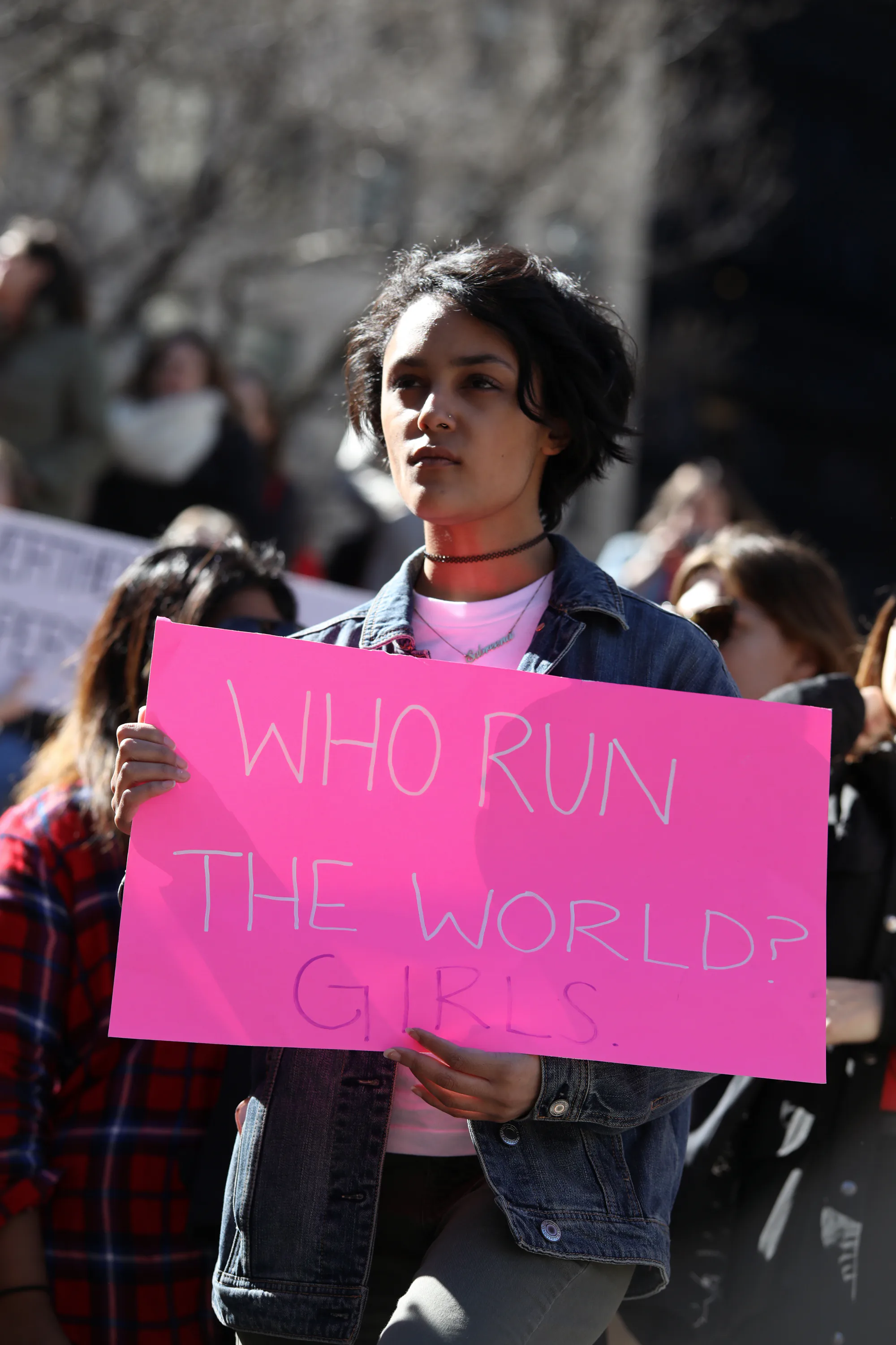 Women gathered with signs and fiery expressions during the strike, embodying resilience and solidarity