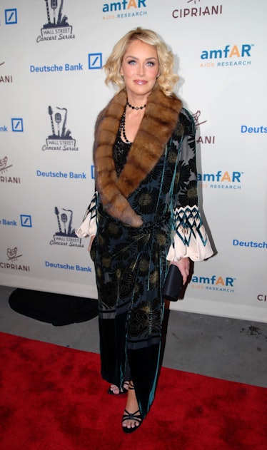 Sharon Stone in a fur-trimmed satin robe at the 2006 amFAR Gala at Cipriani’s Wall Street