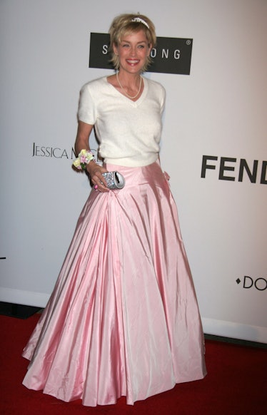 Sharon Stone at the red carpet in a full blown baby pink skirt and white shirt