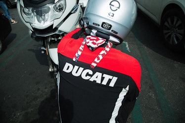 A Calabasas resident wearing a motorcycle helmet and a Ducati shirt