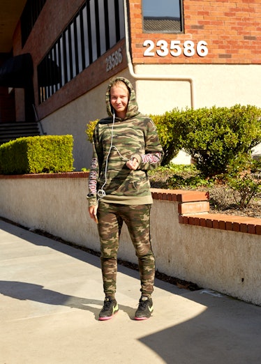  Calabasas resident wearing camouflage sweatpants and a matching hoodie