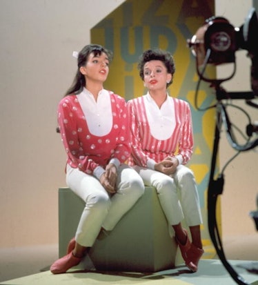 Liza next to Judy Garland in matching sparkly pink outfits