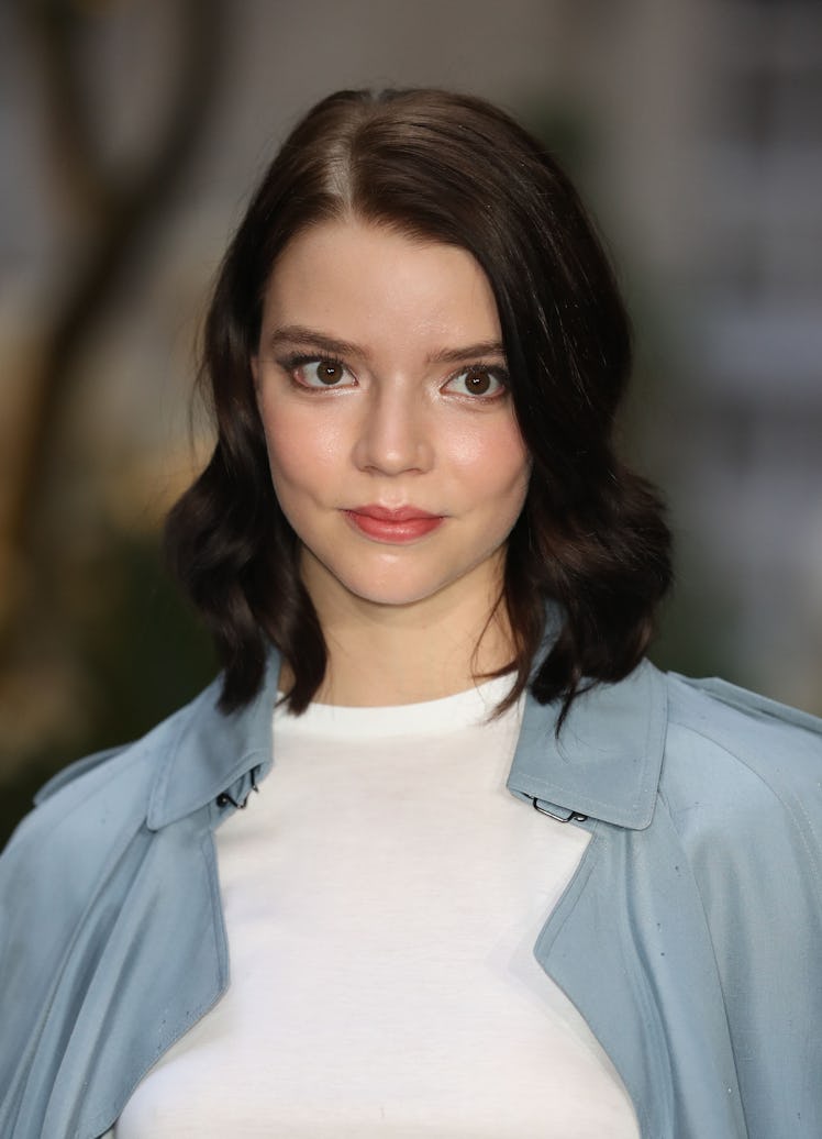 Taylor-Joy looking simple and chic with her locks and luminous skin at the Burberry show