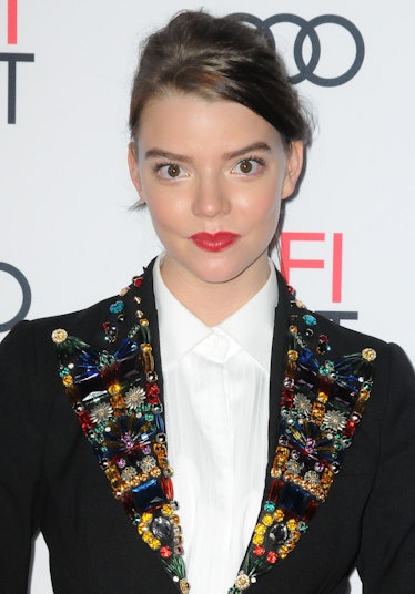 Taylor-Joy looking fresh-faced with a bright coral lip and luminous skinat the AFI Fest 2016 in Holl...