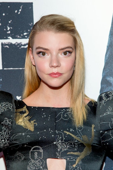 Taylor-Joy at the Split New York premiere wearing straight hair pinned back in a side part. 
