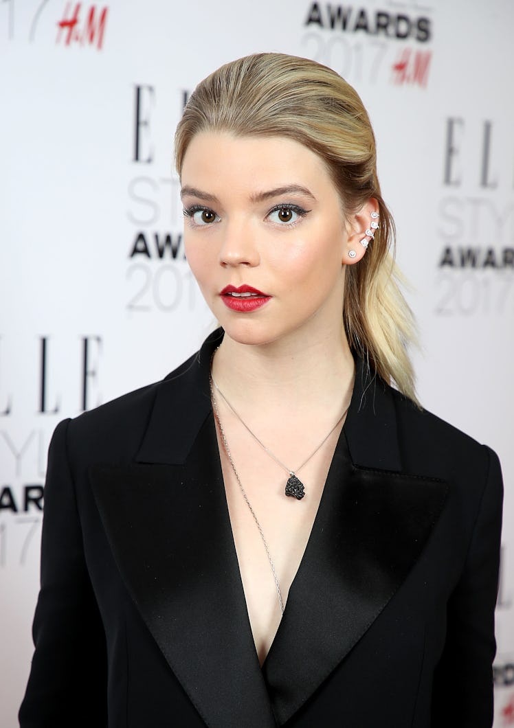 Taylor-Joy at the 2017 Elle Style Awards in London wearing fierce hairstyle with a classic red lip a...
