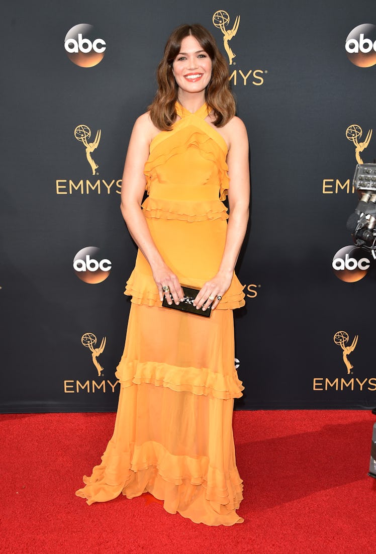 Mandy Moore in a frilled orange dress at the Emmy Awards in 2016.