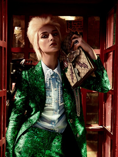 A blonde female model posing in a green sequin blazer and skirt combination on St. Patrick’s Day