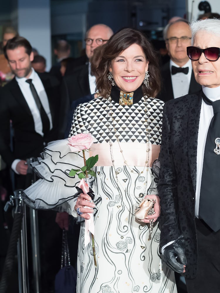 Karl Lagerfeld and Caroline, Princess of Hanover, arrive at the Rose Ball in Monte Carlo, Monaco