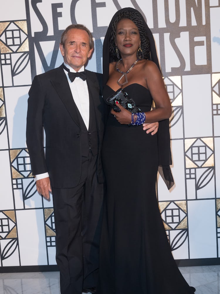 Racecar driver Jacky Ickx and singer Khadja Nin arrive at the Rose Ball in Monte Carlo, Monaco