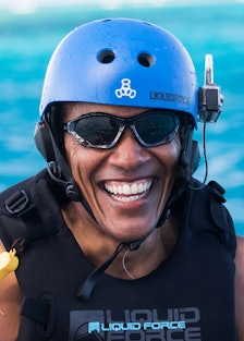 Former President Barack Obama Goes Kitesurfing In The Caribbean
