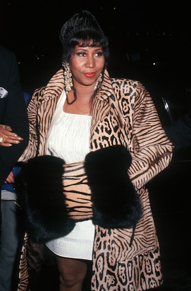 Aretha Franklin in a  leopard-and-zebra print jacket, and a white dress in 1992