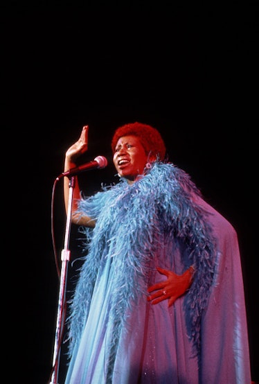 Aretha Franklin in a blue feather dress in 1985
