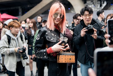 A stylish attendee standing out with her fashion-forward look at Seoul Fashion Week.
