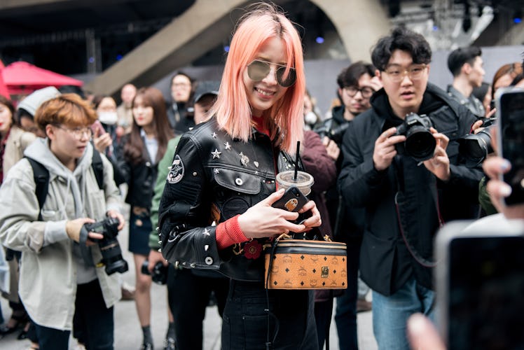 A stylish attendee standing out with her fashion-forward look at Seoul Fashion Week.