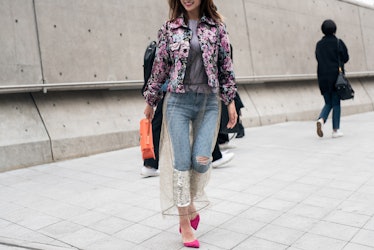 A chic trendsetter flaunting her impeccable fashion sense during Seoul Fashion Week.