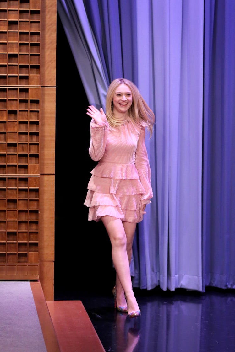 Dakota Fanning in pink dress. 