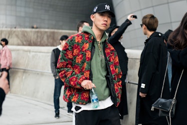 A trend-conscious individual exuding his fashion flair at Seoul Fashion Week.