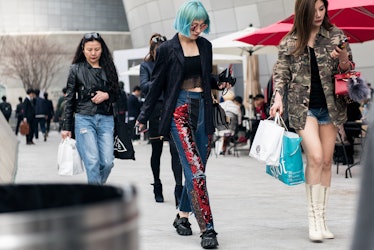 Style enthusiasts expressing their unique creativity during Seoul Fashion Week.