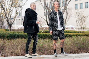 Trendsetting personalities displaying their fashion choices in Seoul.