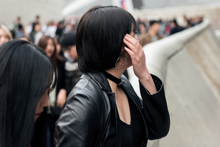 Fashion-forward crowd showcasing their street style in Seoul.