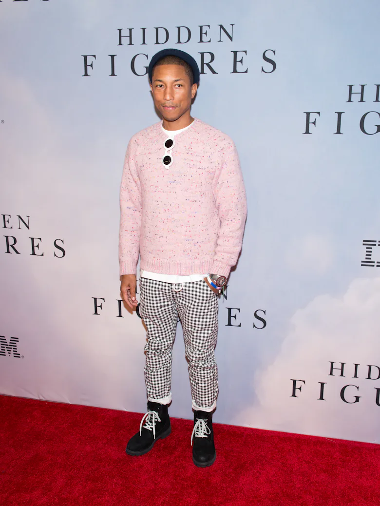 pharrell williams dressed in pink Pharrell at the 68th Grammy awards accepting the Global Impact award and performing "So Far Ahead" with Clipse and Voices of Fire (: A. Sussman, E. McIntyre, M. Schipper, J. Nunez,