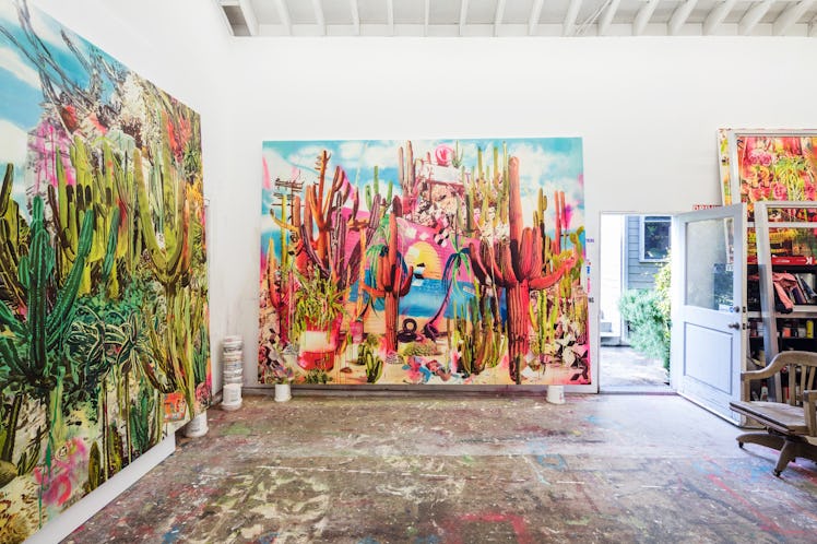 The inside of Rosson Crow studio with two multi-colored abstract paintings
