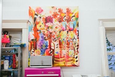 The inside of Rosson Crow studio with a flower painting on a wall