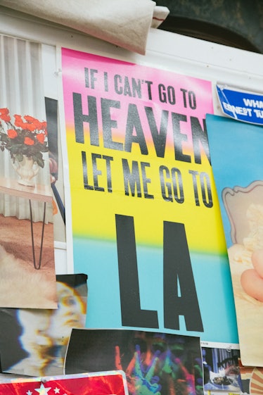 The inside of Rosson Crow studio with a poster with the text 'If I can't go to heaven let me go to L...