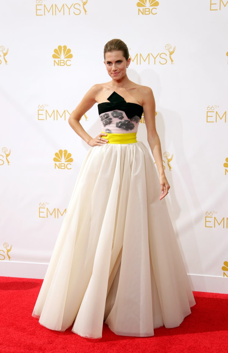 Allison Williams posing in a black and white gown at the 66th Annual Primetime Emmy Awards