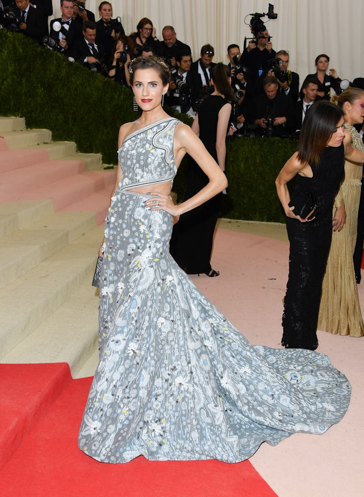 Allison Williams posing in a silver gown at the Met’s Costume Institute Gala 