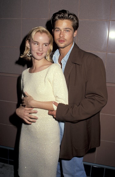 Brad Pitt and Juliette Lewis hugging at the AMC Theater in Santa Monica