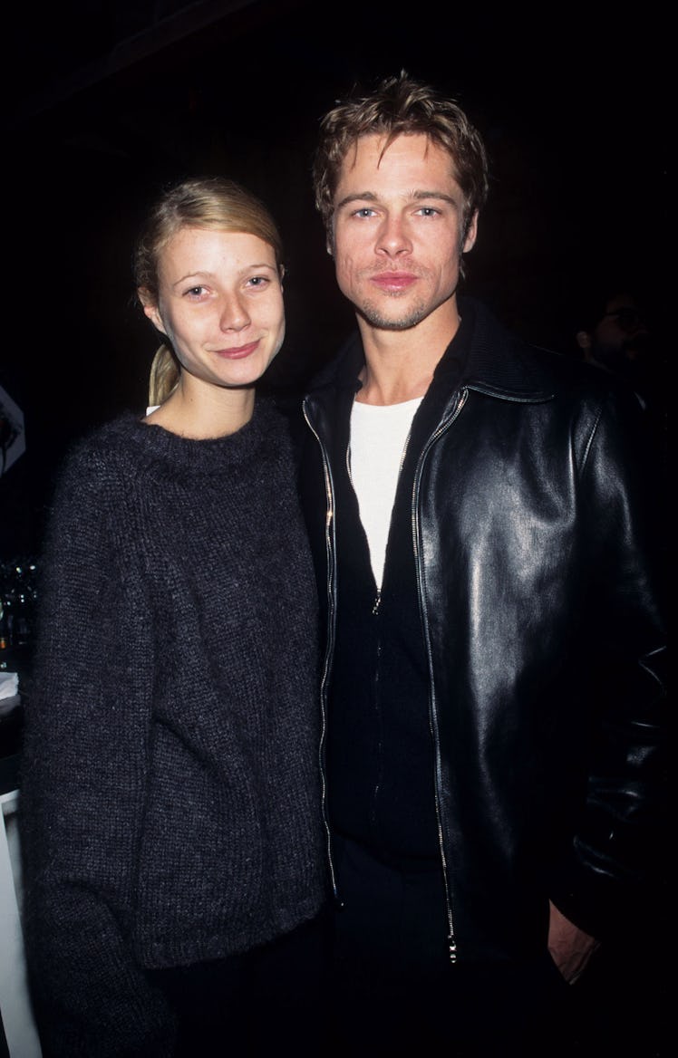 Gwyneth Paltrow and Brad Pitt smiling and hugging