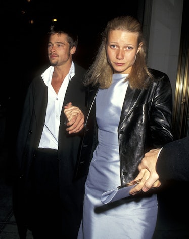 Brad Pitt walking and holding hands with Gwyneth Paltrow