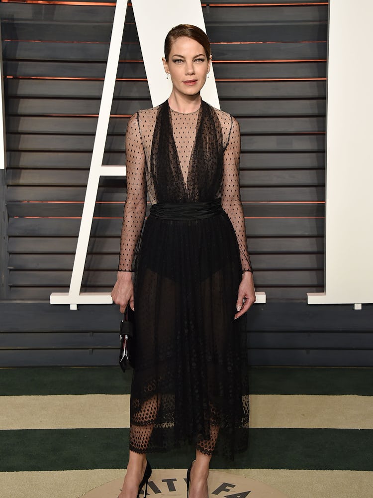 Michelle Monaghan wearing a black vintage dress at the 2016 Vanity Fair Oscar Party